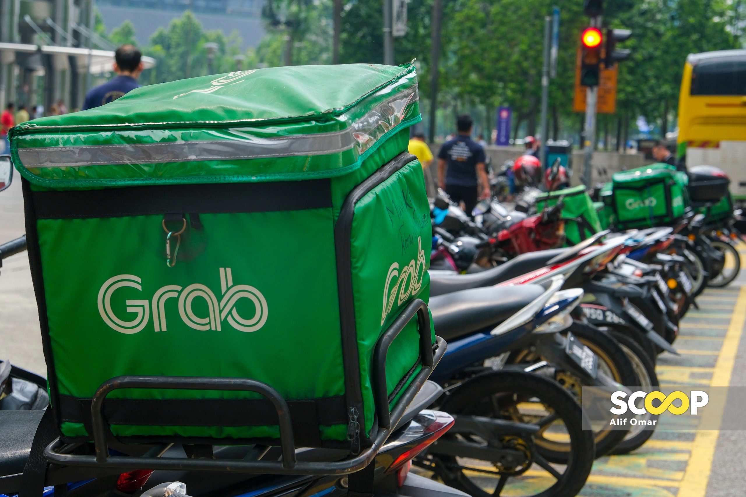 Grab boosts delivery fee, compensation frameworks for delivery riders, drivers