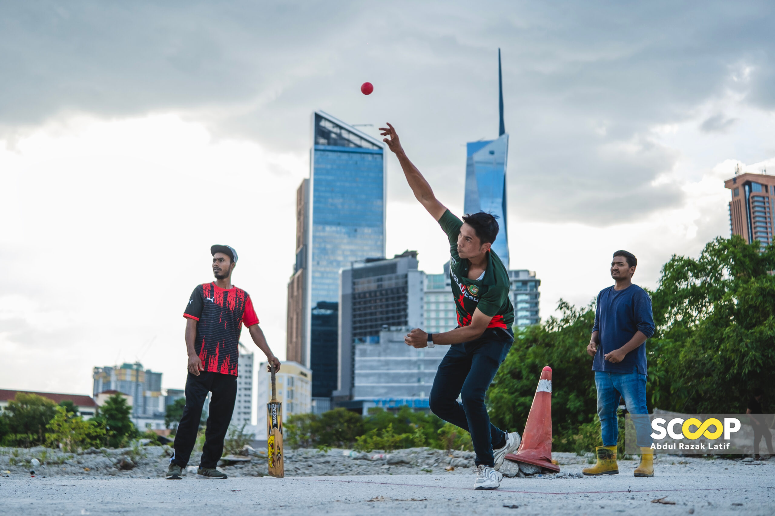 Photo of the day: Migrant workers' cricket passion shines in abandoned spaces