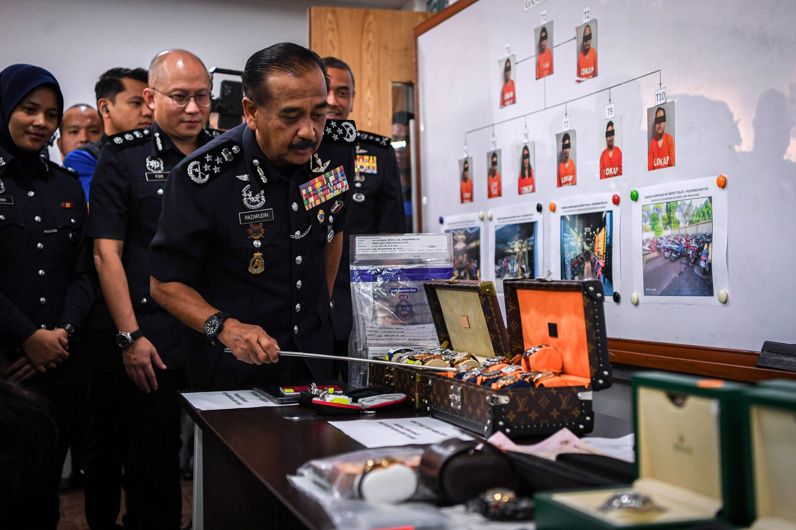 Forex, crypto ring busted, RM51 mil in luxury goods seized
