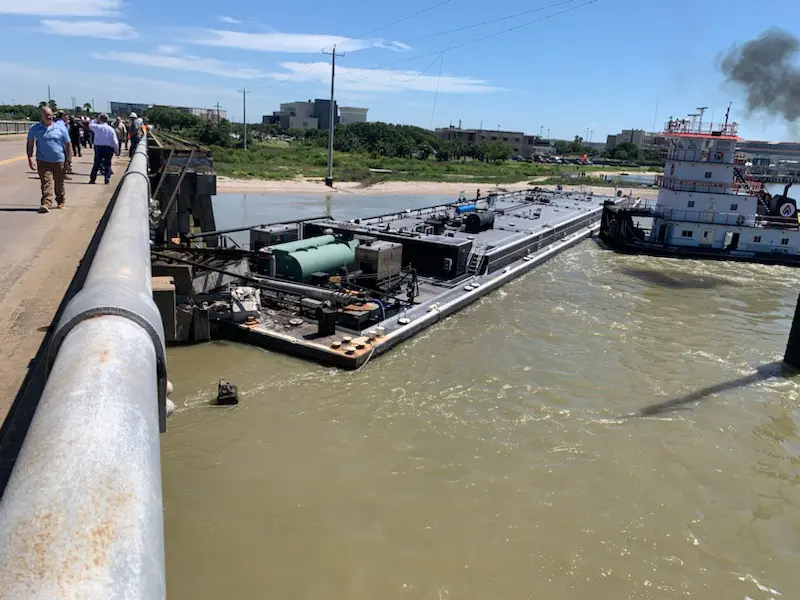 Barge crashes into Texas bridge, causing oil spill, partial collapse