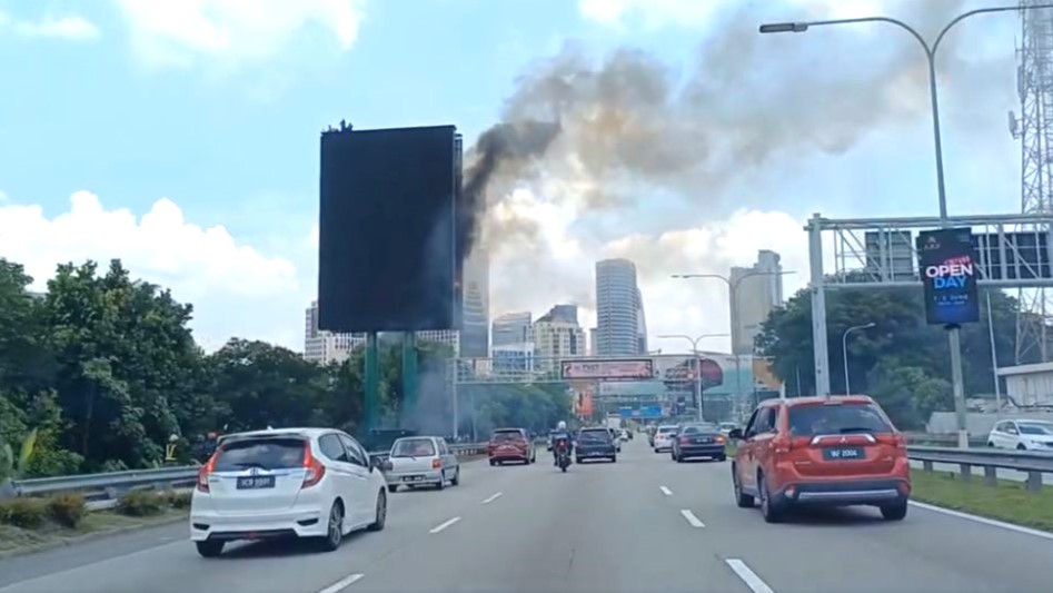 Digital billboard catches fire, debris falls along Federal Highway