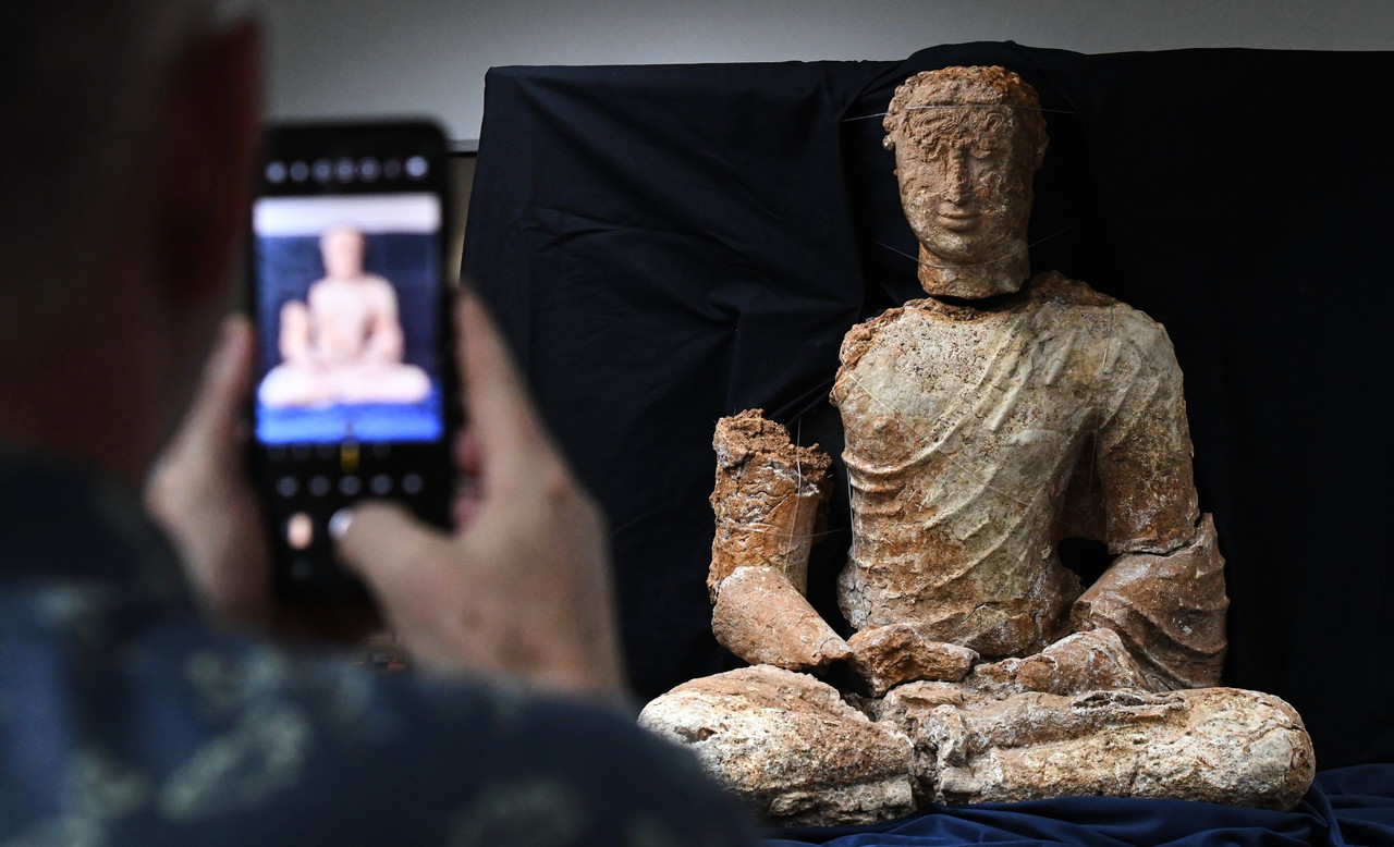 Nearly intact Buddha statue predating Angkor Wat among hidden gems unearthed at Bukit Choras
