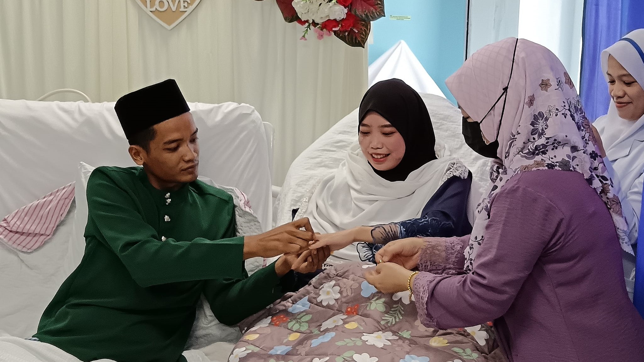 Love knows no bounds: couple exchange vows in Sandakan hospital after accident