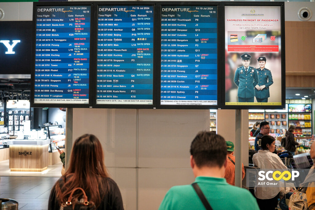 19072024 - Gangguan Microsoft Cloud Penumpang di KLIA2 terjejas akibat daftar masuk manual kerana beberapa penerbangan ditangguhkan dan dibatalkan - ALIF OMAR_19