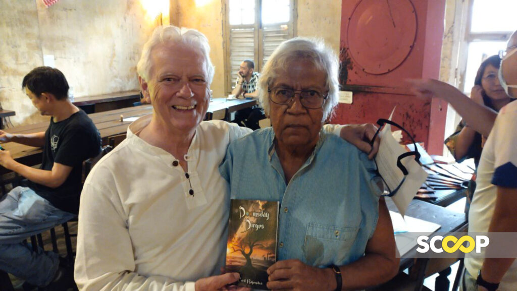 Irish humanitarian activist Paddy Maguinness (left) with lawyer-poet Cecil Rajendra (right) at the Doomsday Dirges poetry collection launch event