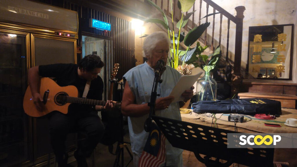 Lawyer-poet Cecil Rajendra reciting some of the poems in his _Doomsday Dirges_ poetry collection at the book launch event at Gedung Cafe 2